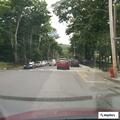 Minor crash with mirror damage at West and Holland