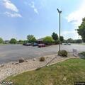 Van left in bank parking lot during asphalt work