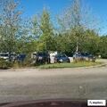 Bus and car crash in visitor center parking lot