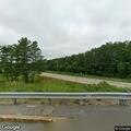 Propane grill tank leaking near parked car in Bethel