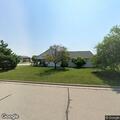 Person experiencing chest pain at De Pere residence