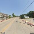 Man with back pain and broken wrist in De Pere