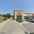 Storefront window shattered at De Pere coffee shop