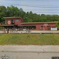 Woods fire reported behind Vintage Junkie store