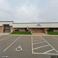 Man in car at police dept reports chest pains