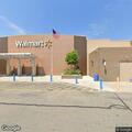 Man pacing and staring at shoppers at Walmart