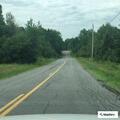Driver hits guardrail and is stopped by officer