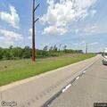 Speeding vehicle passing on shoulder on Highway 52