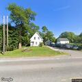 Driver reports damage after near collision in Surry