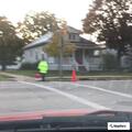 Suspicious red sedan circling Seymour parking lot