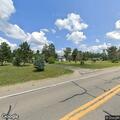 Woman near Hilltop Drive experiencing vomiting and back pain