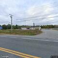 Woman experiencing racing heart in vehicle at Dollar General