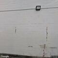 Man sleeping in parking lot at Park Plaza