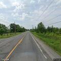 Woman with chest pain in silver pickup on NY-56