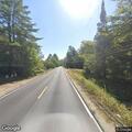 Truck hauling turbine blocks road at Roxbury Notch