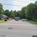 Fire crew checks carbon monoxide alarm at home