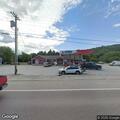 Male found face down by bicycle behind deli is conscious
