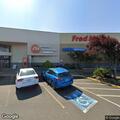 Minor vehicle damage in Fred Meyer parking lot