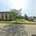 Woman in distress outside Marshfield Library on phone