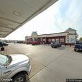Elderly woman injures hip after fall at store parking lot