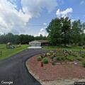 Riding lawnmower fire in yard near Augusta