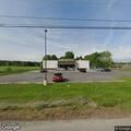 Female found slumped in vehicle at Dollar General
