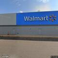 Police check green and black semi near Walmart