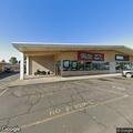 Elderly woman slumped over in car at auto parts store