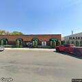 Man jumps in front of vehicle near furniture store