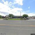 Pregnant woman vomiting at Travel Lodge lot in Lovell