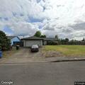 Female experiencing breathing problems near Aumsville