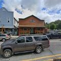Unoccupied silver sedan with front-end damage found