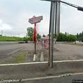 Man in skull mask chasing cars near drive-in