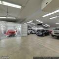 Customer backs into vehicles at body shop