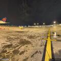 Person experiencing sharp right side pain at airport