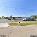 Car leaking fuel at Dollar General parking lot