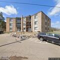 Person needing help to stand at Tonkaway Apartments