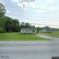 Pickup truck damages lawn on Vermont Route 105