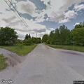 Unresponsive truck driver in road, suspected impaired