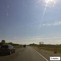 Driver reports tailgating and erratic pickup on I-94