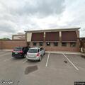Unresponsive person found in sports saloon booth