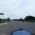 Person struggling to breathe at bus stop in Minneapolis