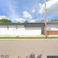 Woman dizzy and sweaty outdoors near 2nd Street South in Winsted