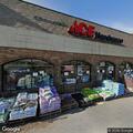 Officer checks two vehicles at Ace Hardware