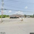Elderly man falls and suffers head injury in parking lot