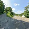 Tree on wires blocks Clearfield Pike roadway