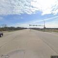 Outdoor trash fire with heavy black smoke reported