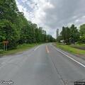 Erratic driver in black Nissan on Route 28