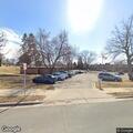 Person with abdominal pain at Zealand Ave N parking lot