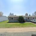 Person with abdominal pain at home in Rockford